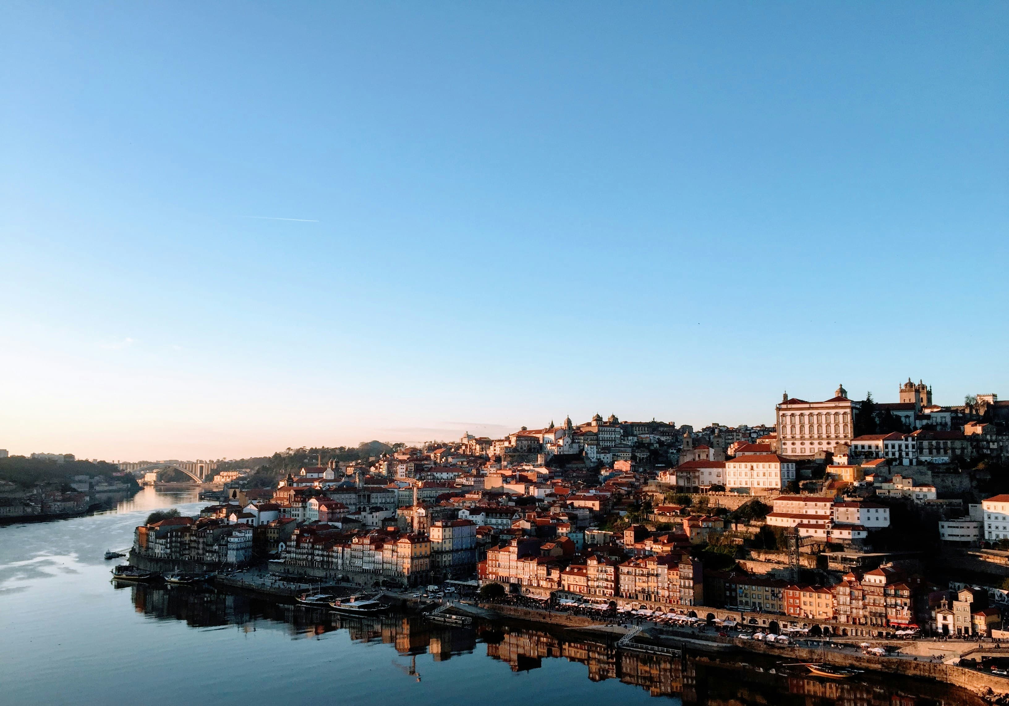 Colorful traditional houses lining the Douro river in Porto Portugal